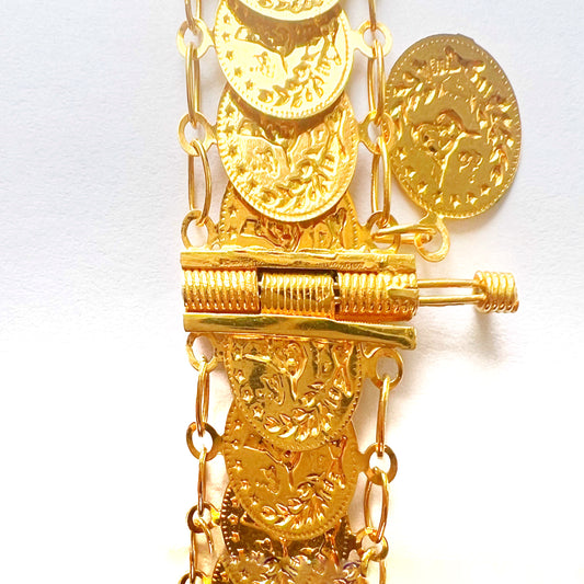 Exklusivt armband i 21K guld – Designat med sammankopplade mynt