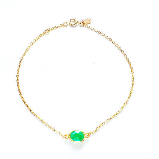Enkel armband i 18K guld med colombiansk smaragd