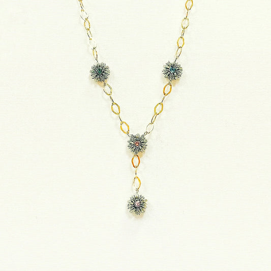 SILVERHALSBAND DAM BLOMMOR