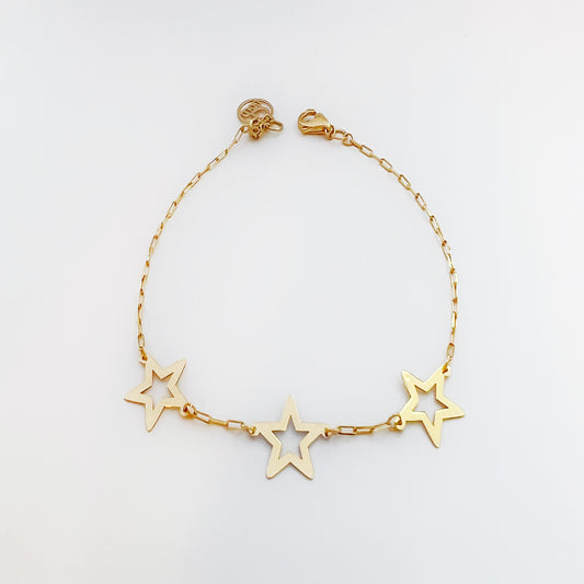 Armband i 18K guld med vitguldstjärna – vändbar design