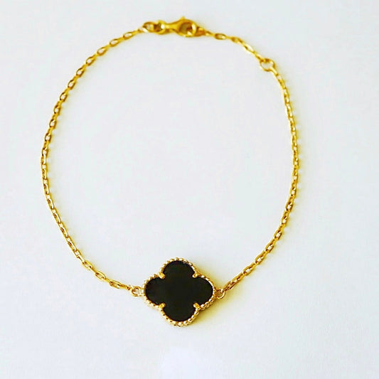 Exklusivt armband 18 k svart klöver