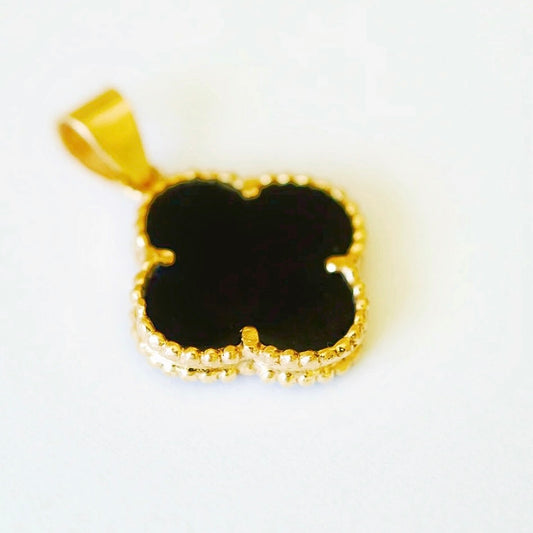 Exklusiva hängsmycken i 18 k svart klöver