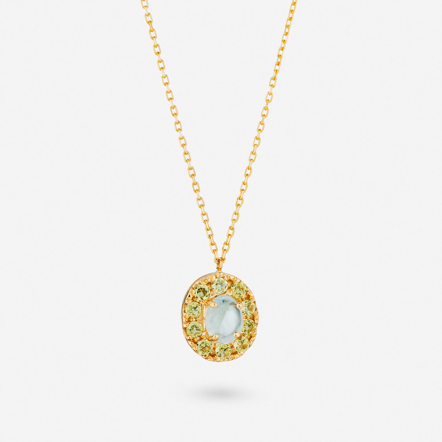 Guldhalsband smycke med akvamarin och peridot.