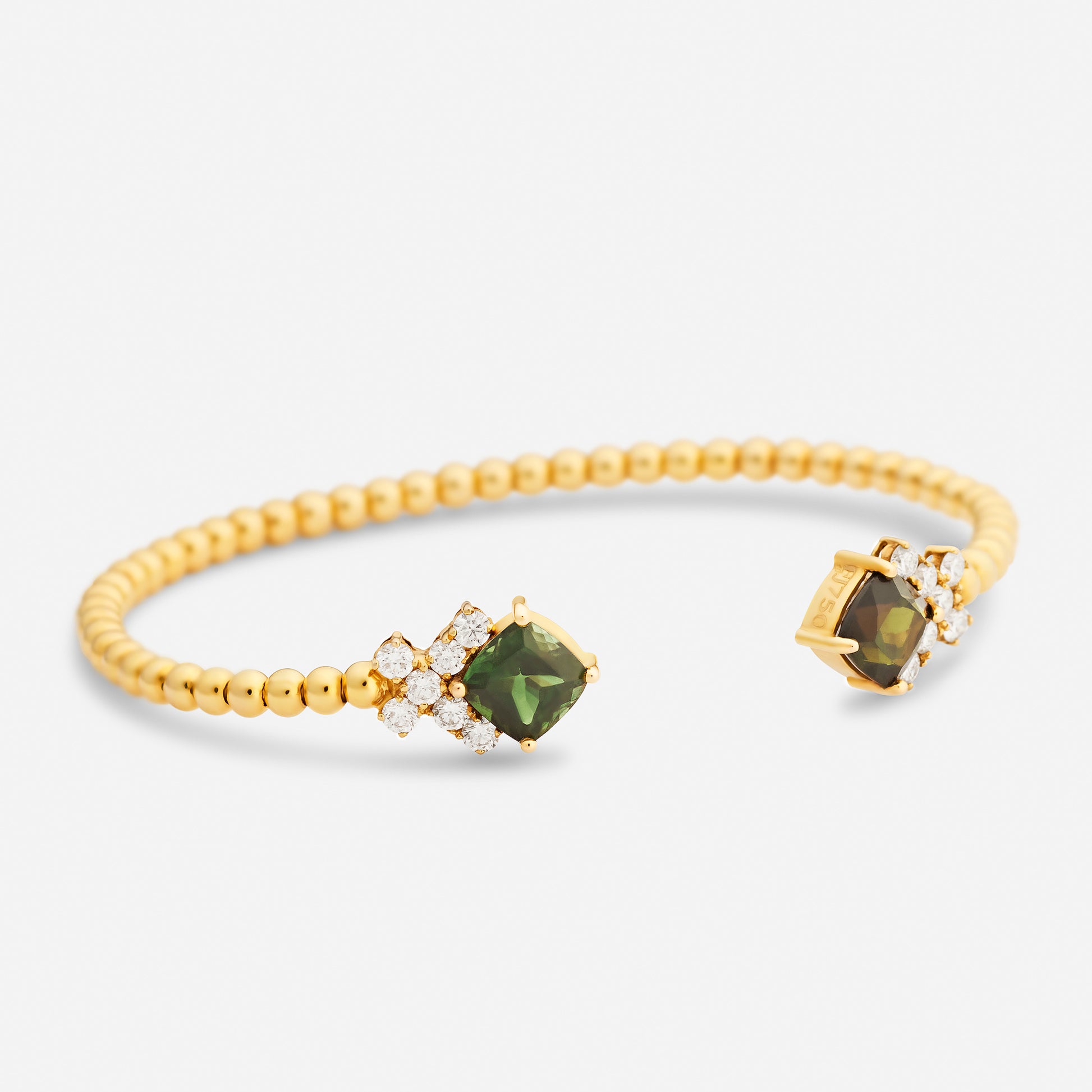 Handgjort armband smycken i 18 karat guld med två turmaliner och diamanter.
