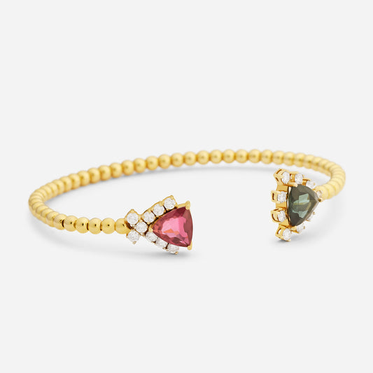Handgjort armband smycken i 18 karat guld med två rubiner och diamanter.